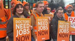 Don't put off treatment during doctors' strike, NHS tells patients