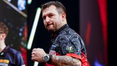 Clayton beats Littler in Rotterdam to extend lead