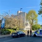 Three charged with arson on Persian media offices