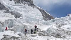 Huge chunk of glacier blocks Everest route in peak climbing season