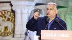 Hungarians decide whether to end 16 years of Orbán rule and elect rival
