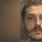 Man who threw girlfriend from tower block jailed